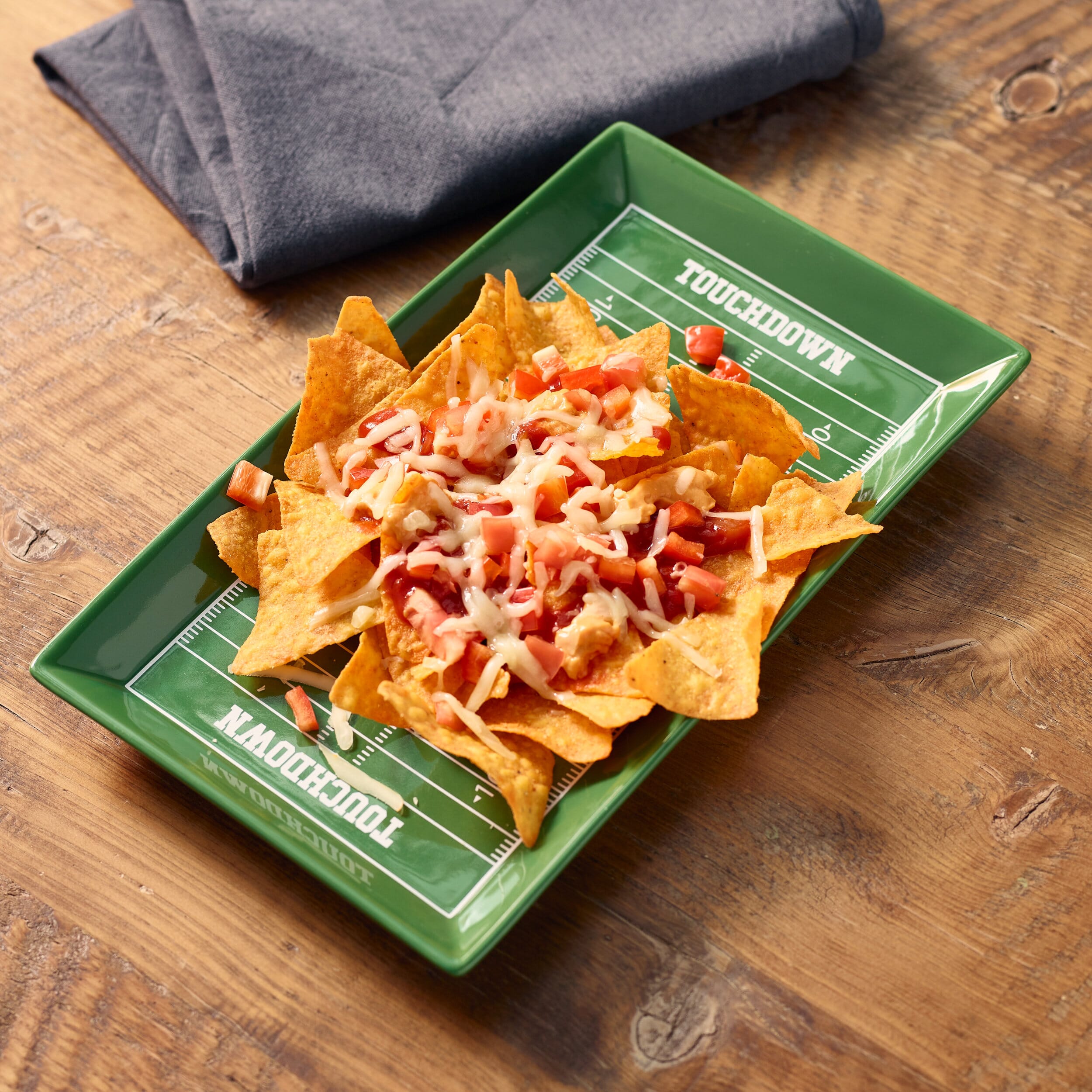 Football Teller mit Chili Cheese Nachos