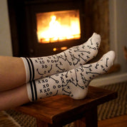 American Football Socken vor dem Kaminfeuer